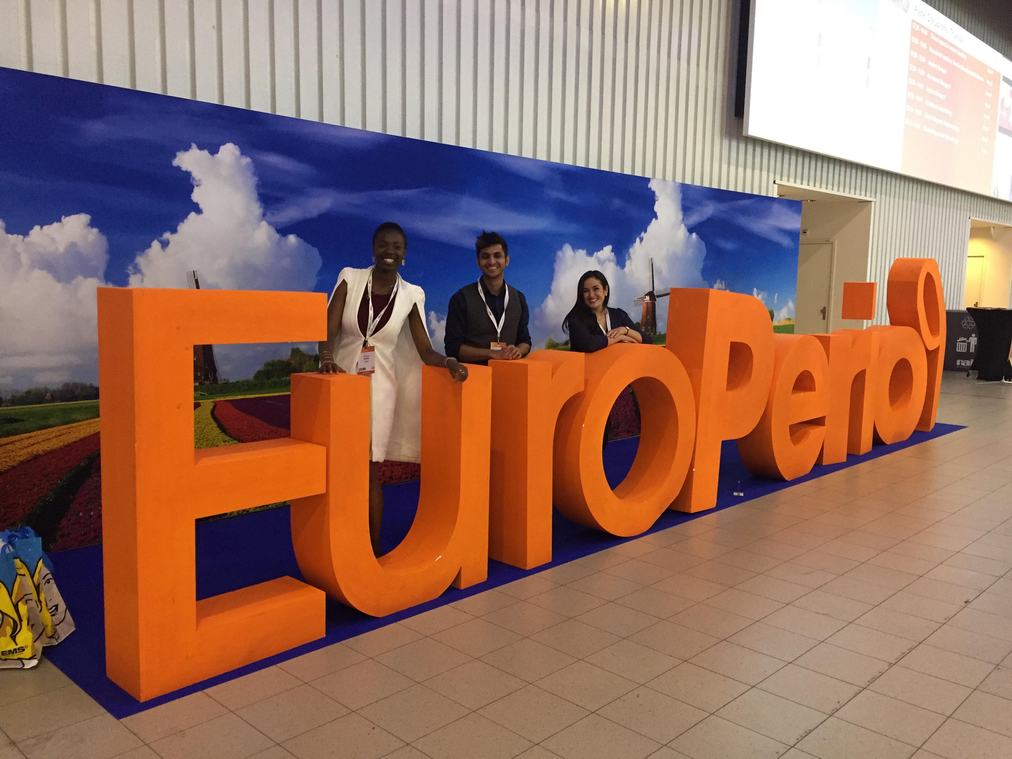 group shot in front of the europerio9 sign